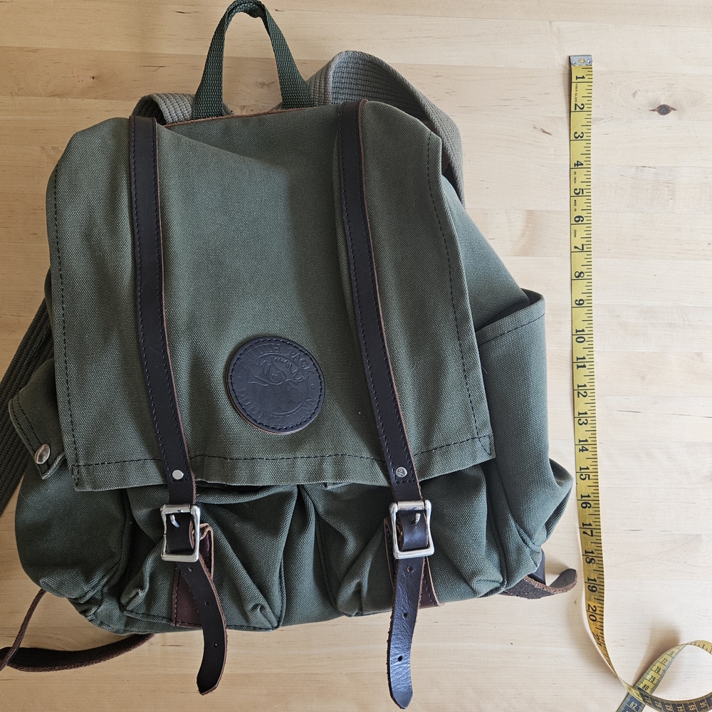 Green and Black Durable Backpack with Multiple Compartments